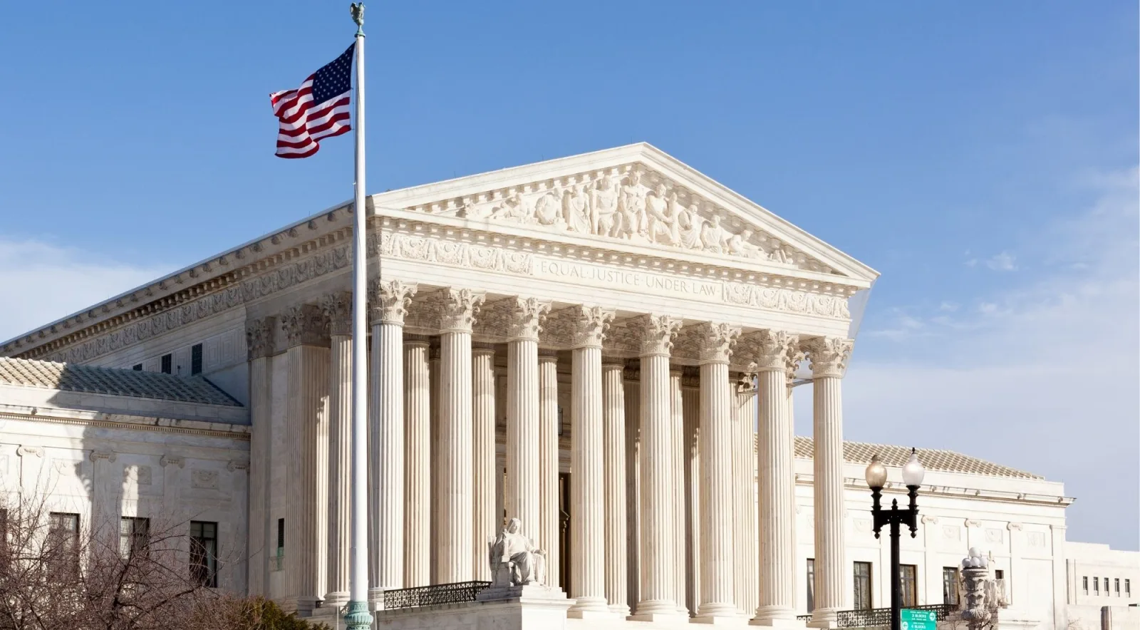 The U.S. Supreme Court building with the American flag