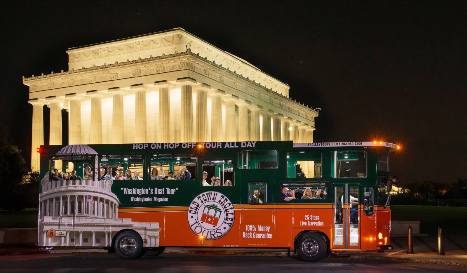 An Old Town Trolley in front of the floodlit Lincoln Memorial at night