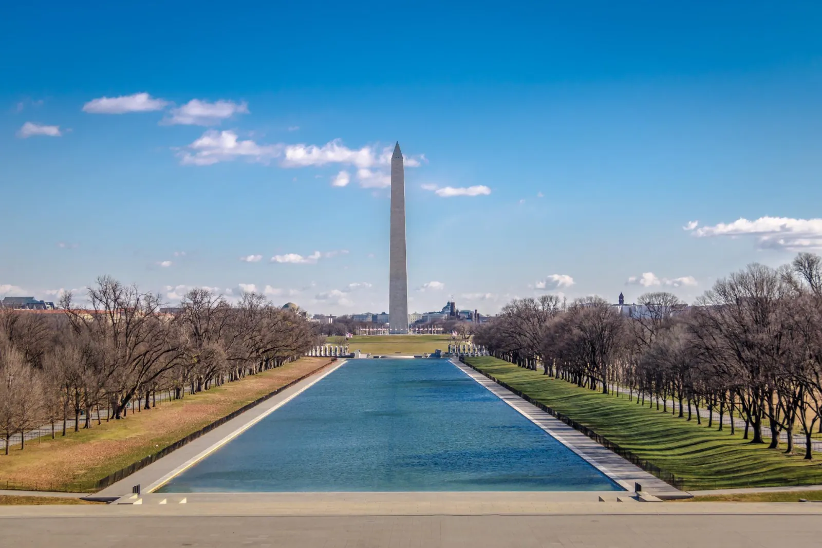 The Washington Monument beyond the Lincoln Memorial Reflecting Pool