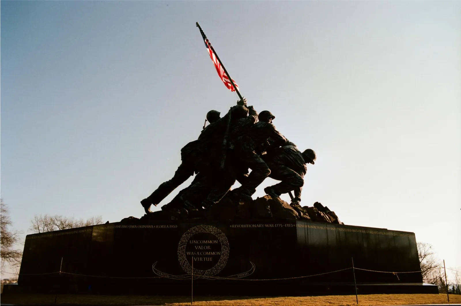 The U.S. Marine Corps War Memorial silhouetted at dusk