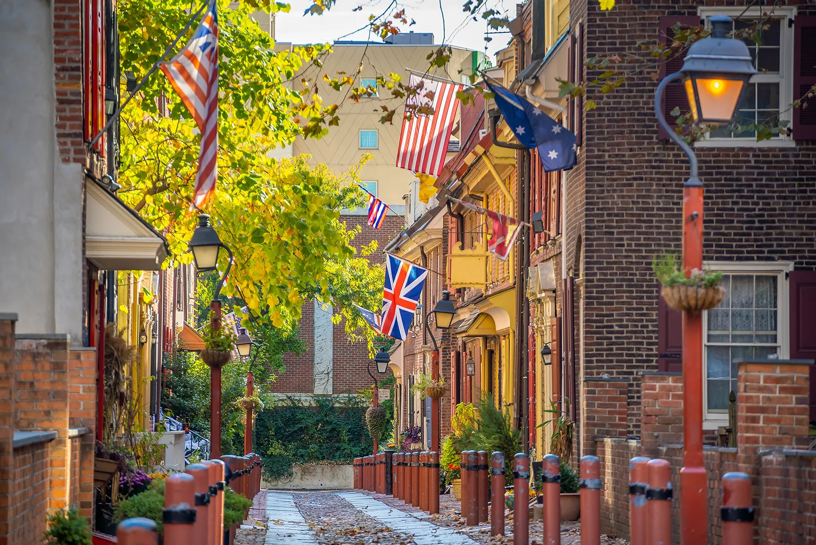 Flags along the brick houses of Elfreth's Alley in Philadelphia