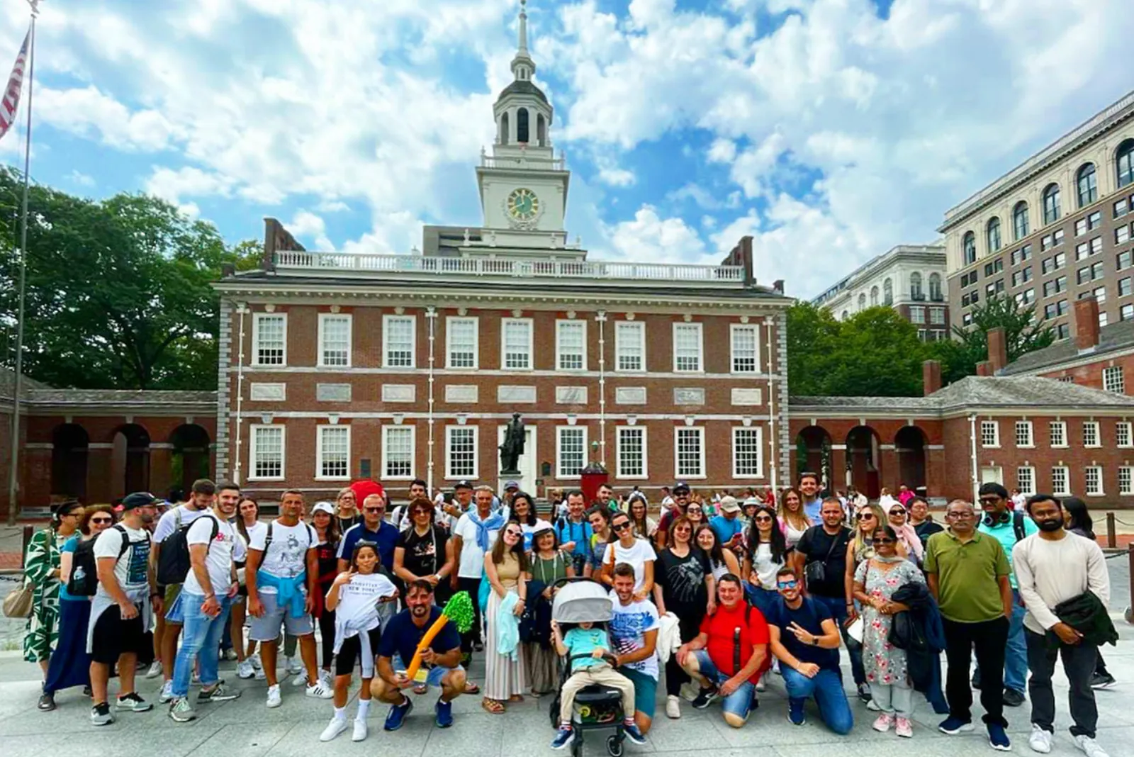 A large tour group outside Independence Hall in Philadelphia